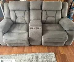 Grey love seat with storage
